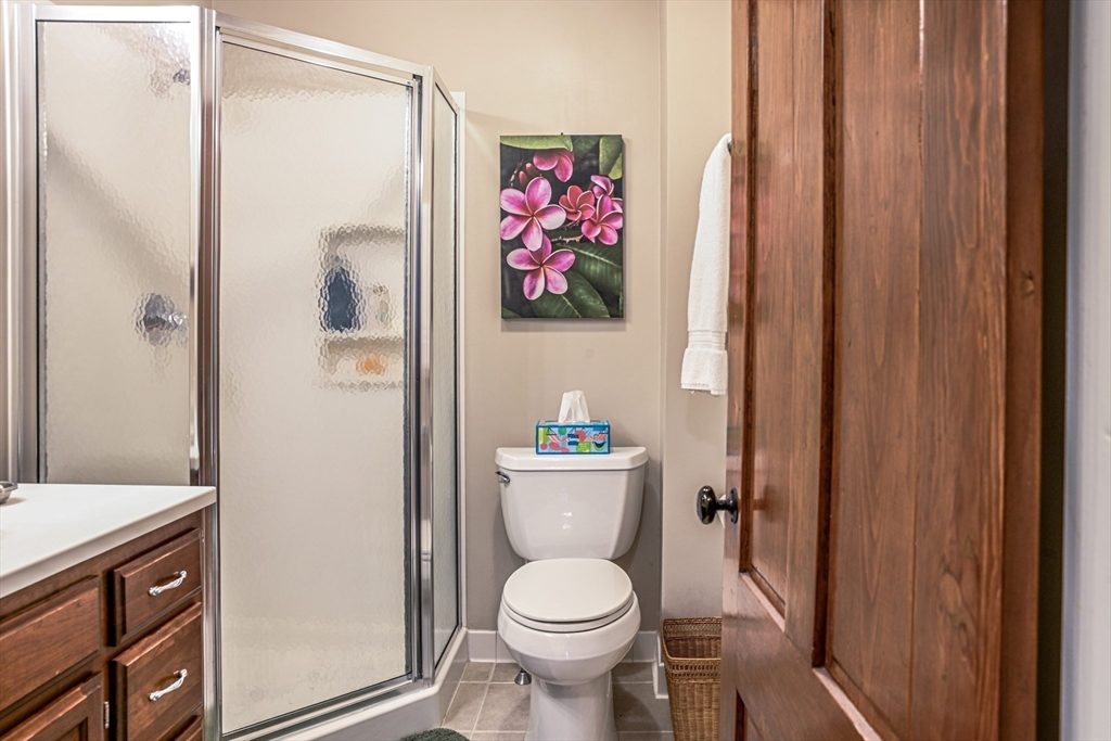 42 Bisson Street Beverly, MA 01915 - Photo 21 of 28 a bathroom with a toilet a sink and wooden floor
