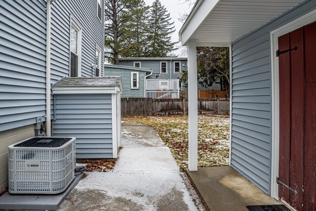 42 Bisson Street Beverly, MA 01915 - Photo 25 of 28 a view of a porch with wooden fence