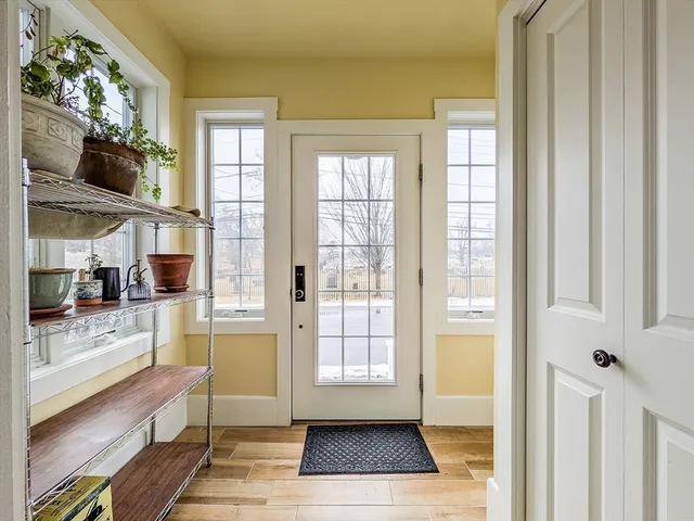a view of living room kitchen and dining room