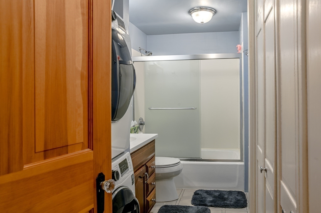 42 Bisson Street Beverly, MA 01915 - Photo 9 of 28 a bathroom with a sink and a mirror