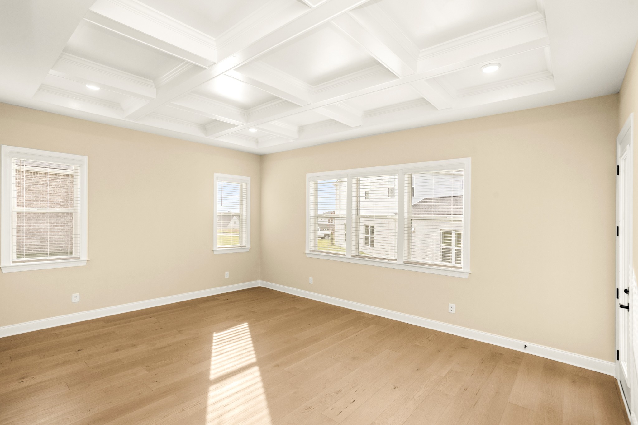 1935 Harmony Road Spring Hill, TN 37174 - Photo 39 of 60 an empty room with wooden floor and windows