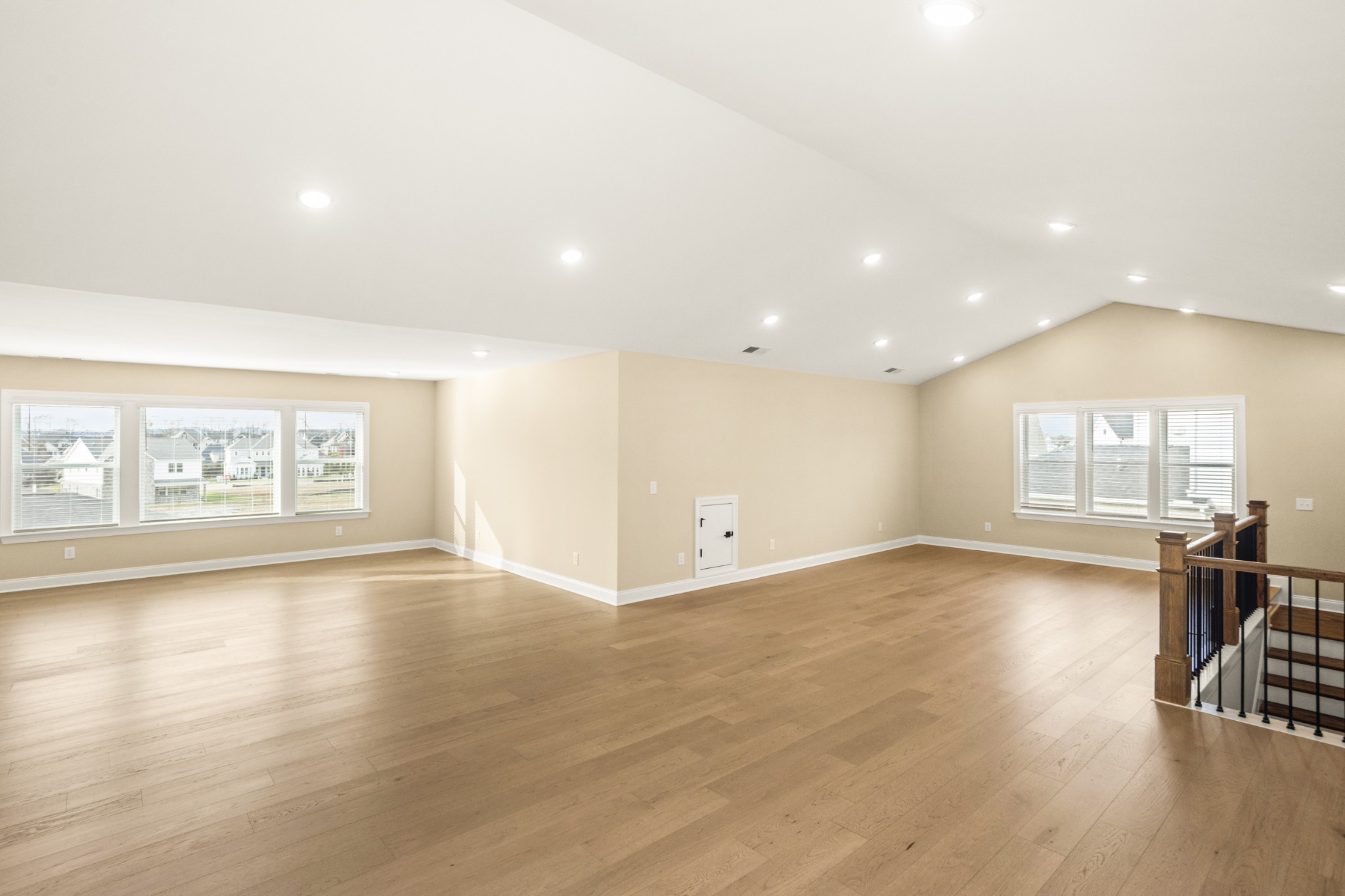 1935 Harmony Road Spring Hill, TN 37174 - Photo 51 of 60 an empty room with wooden floor and windows