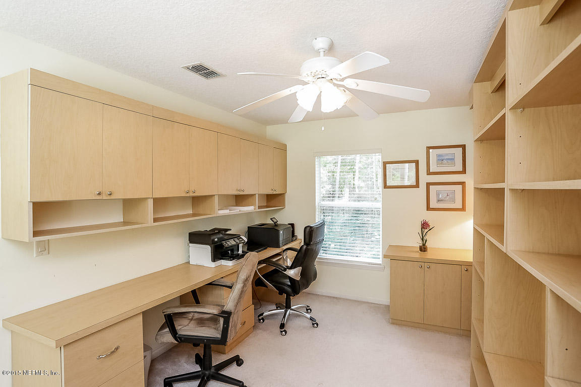 816 Mill Stream Road Ponte Vedra Beach, FL 32082 - Photo 10 of 20 a view of a workspace with furniture and a window