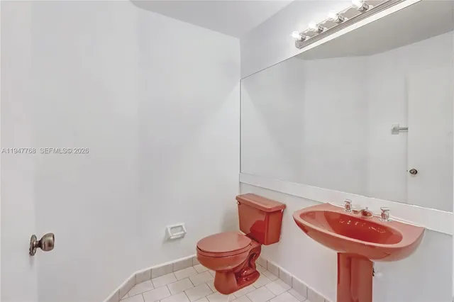 a bathroom with a sink and a toilet