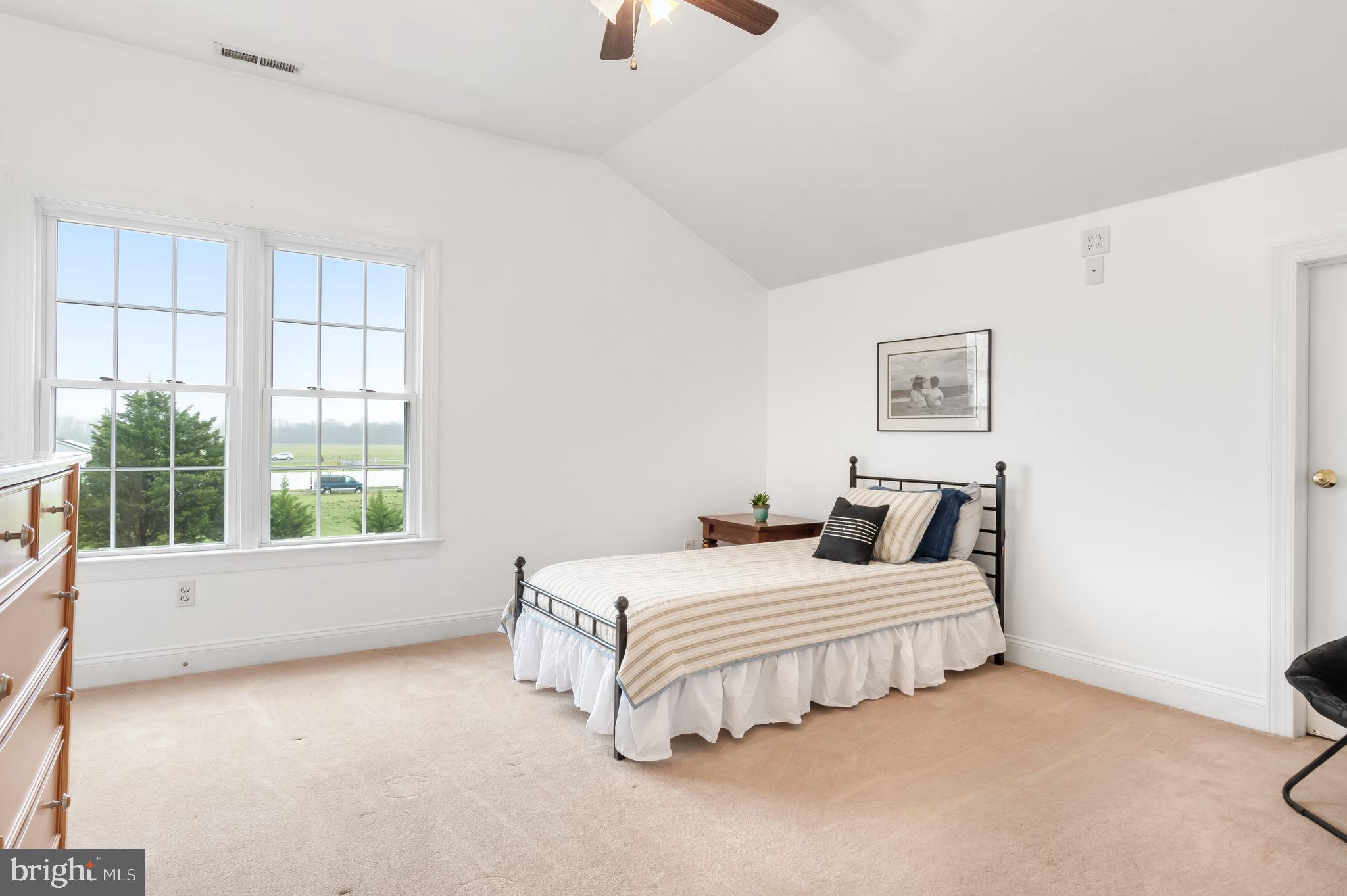 5855 Bethlehem Road Preston, MD 21655 - Photo 39 of 43 a bedroom with a bed and a window