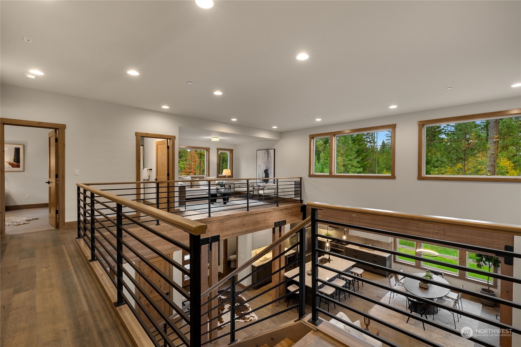331 Old Grv Trail Ronald, WA 98940 - Photo 31 of 40 a view of a kitchen with kitchen island stainless steel appliances wooden floor and windows