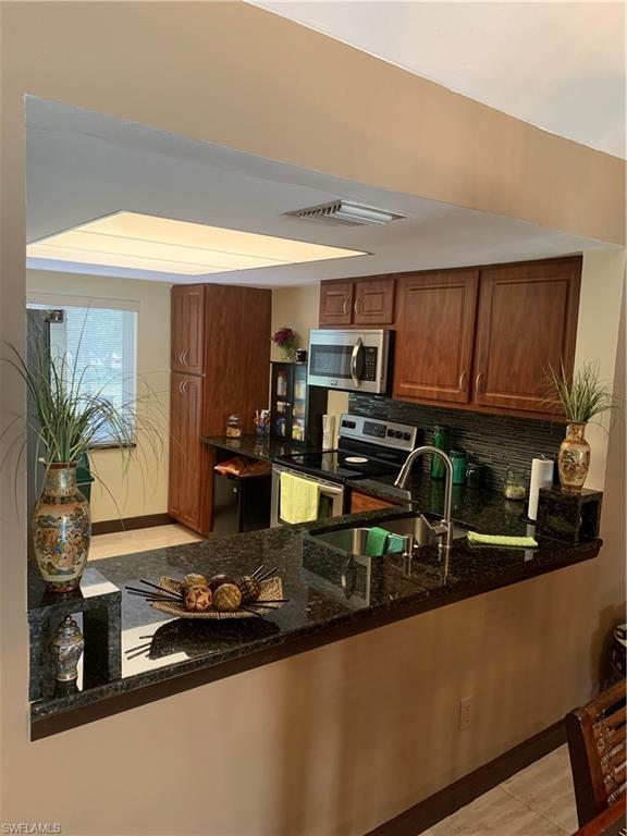 5693 Rattlesnake Hammock Road, Unit 202A Naples, FL 34113 - Photo 5 of 17 Gallery Image 5