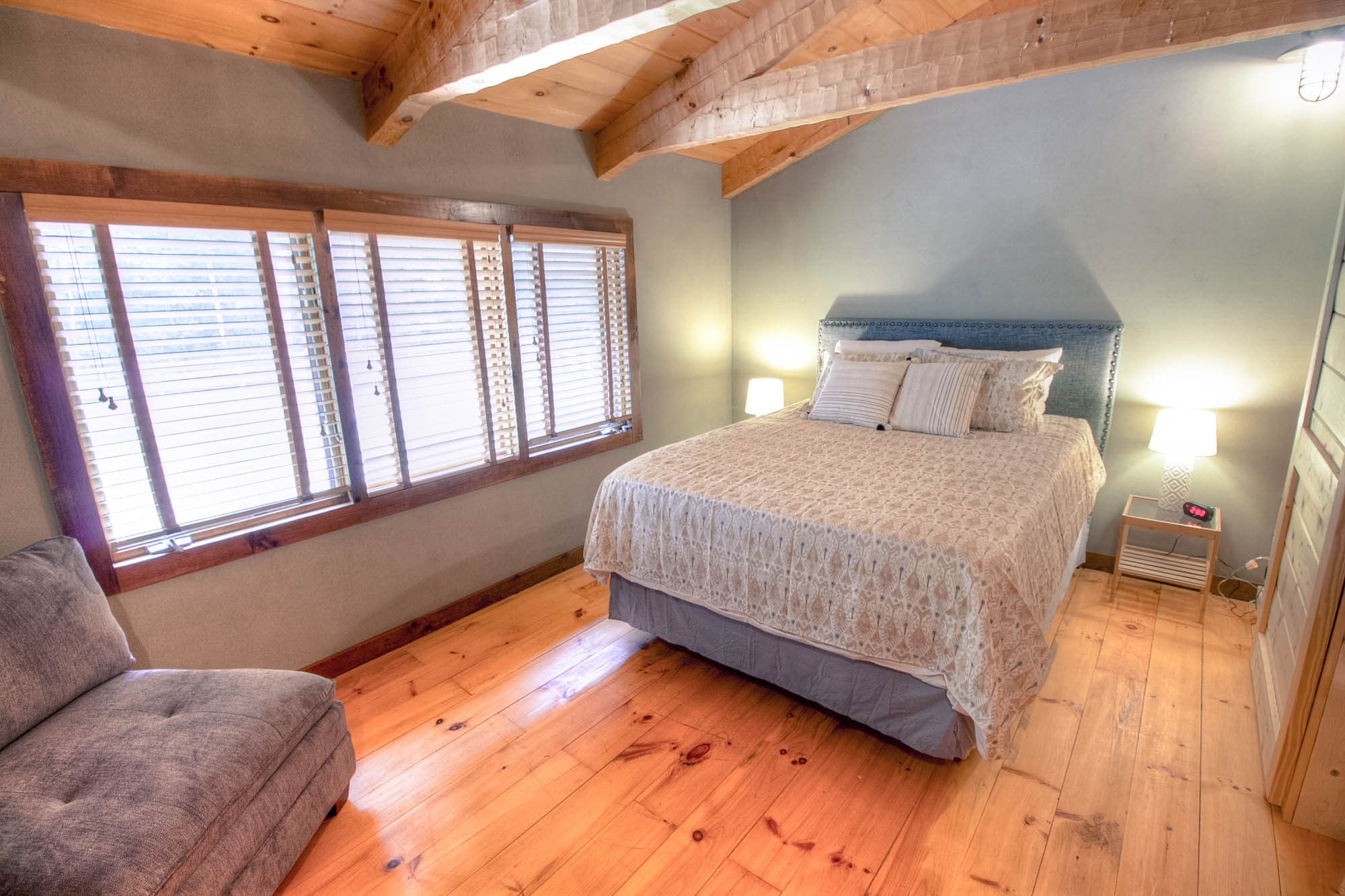 7394 Forest Glenn Road Fairview, TN 37062 - Photo 15 of 30 a bedroom with a bed and wooden floor