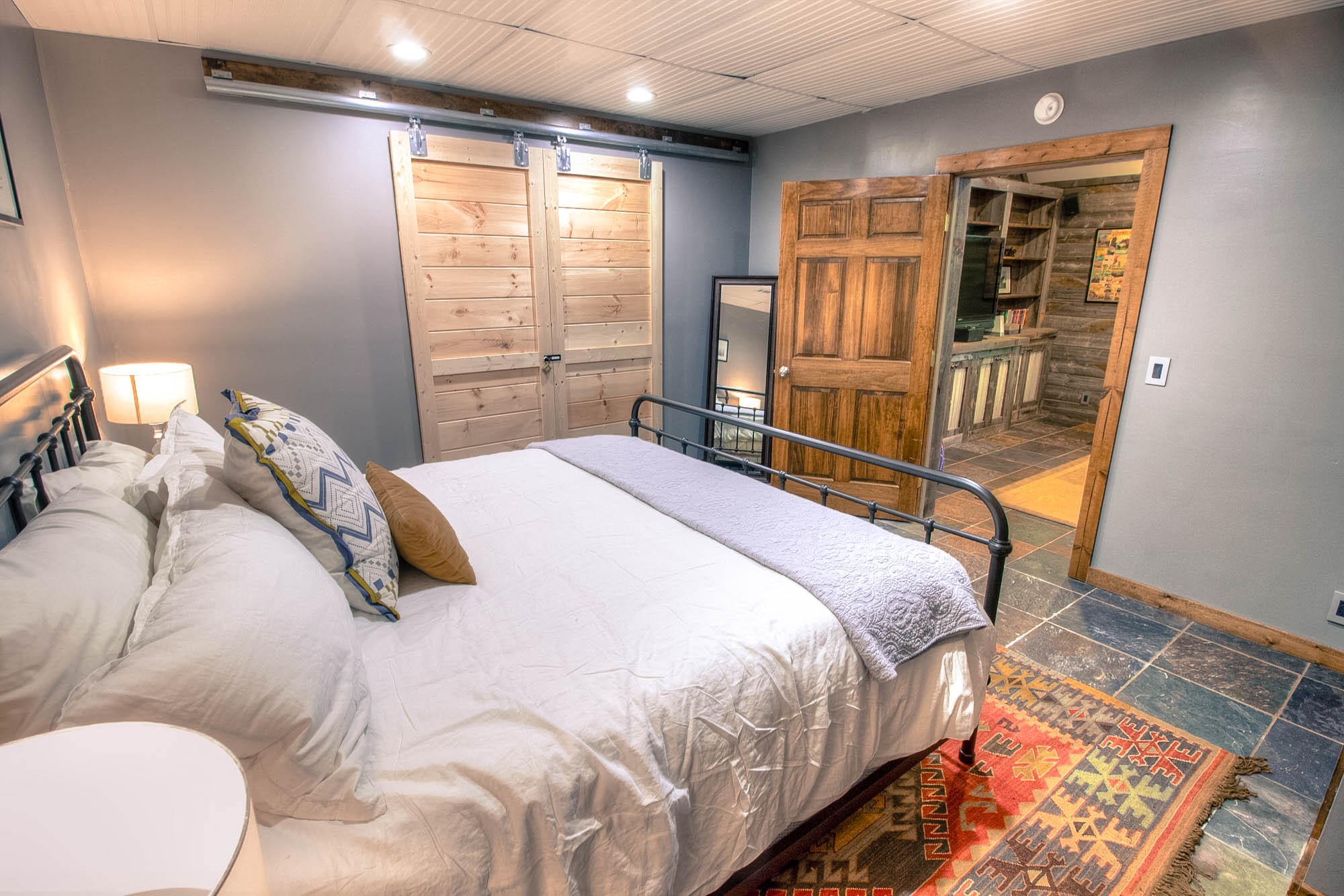 7394 Forest Glenn Road Fairview, TN 37062 - Photo 21 of 30 a bedroom with a bed and wooden floor