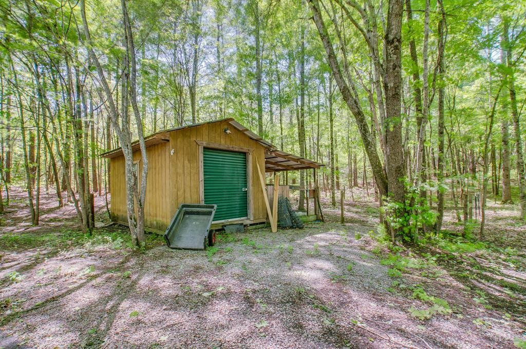 7394 Forest Glenn Road Fairview, TN 37062 - Photo 29 of 30 a backyard of a house with seating area