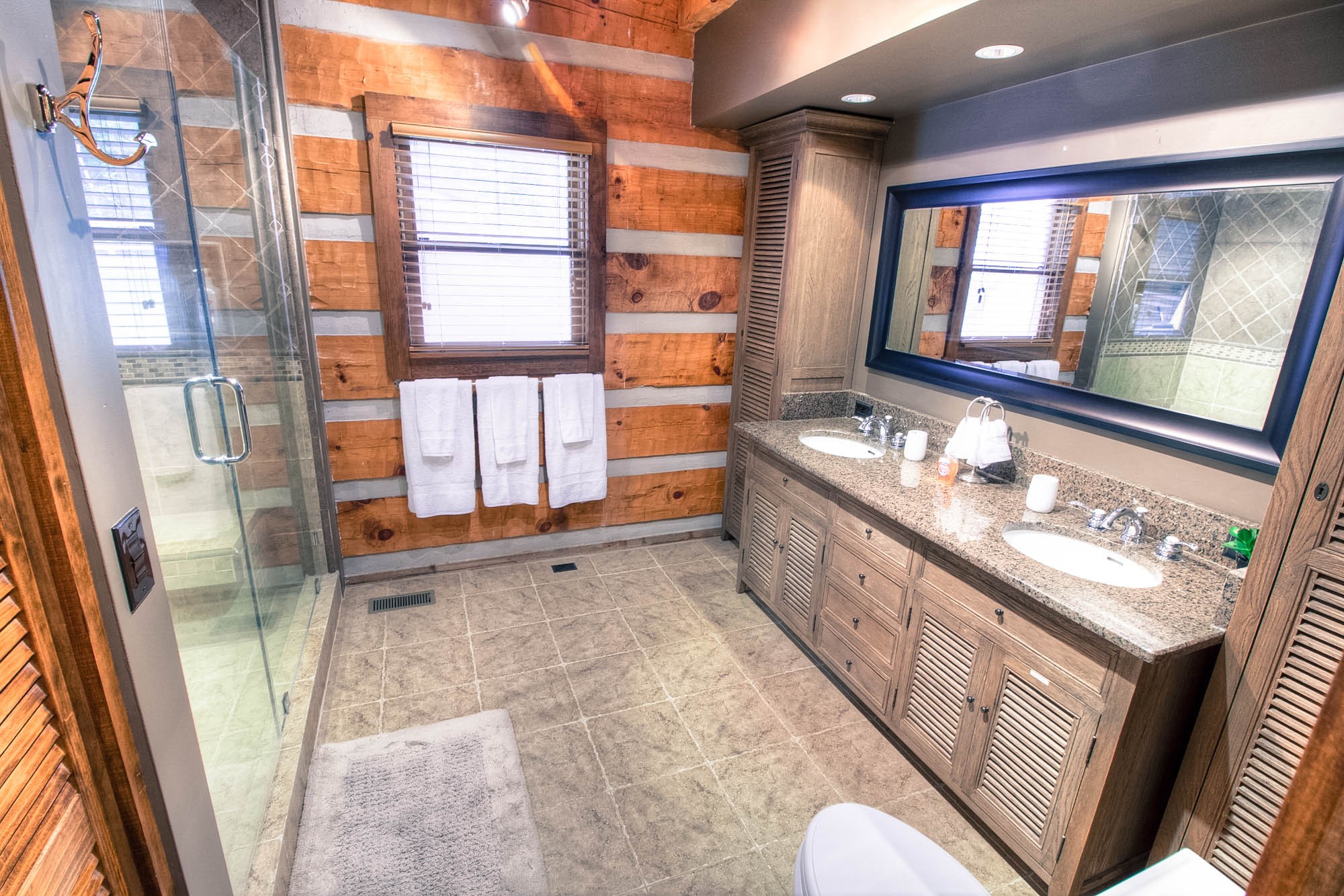 7394 Forest Glenn Road Fairview, TN 37062 - Photo 9 of 30 a bathroom with a sink mirror and a bathtub