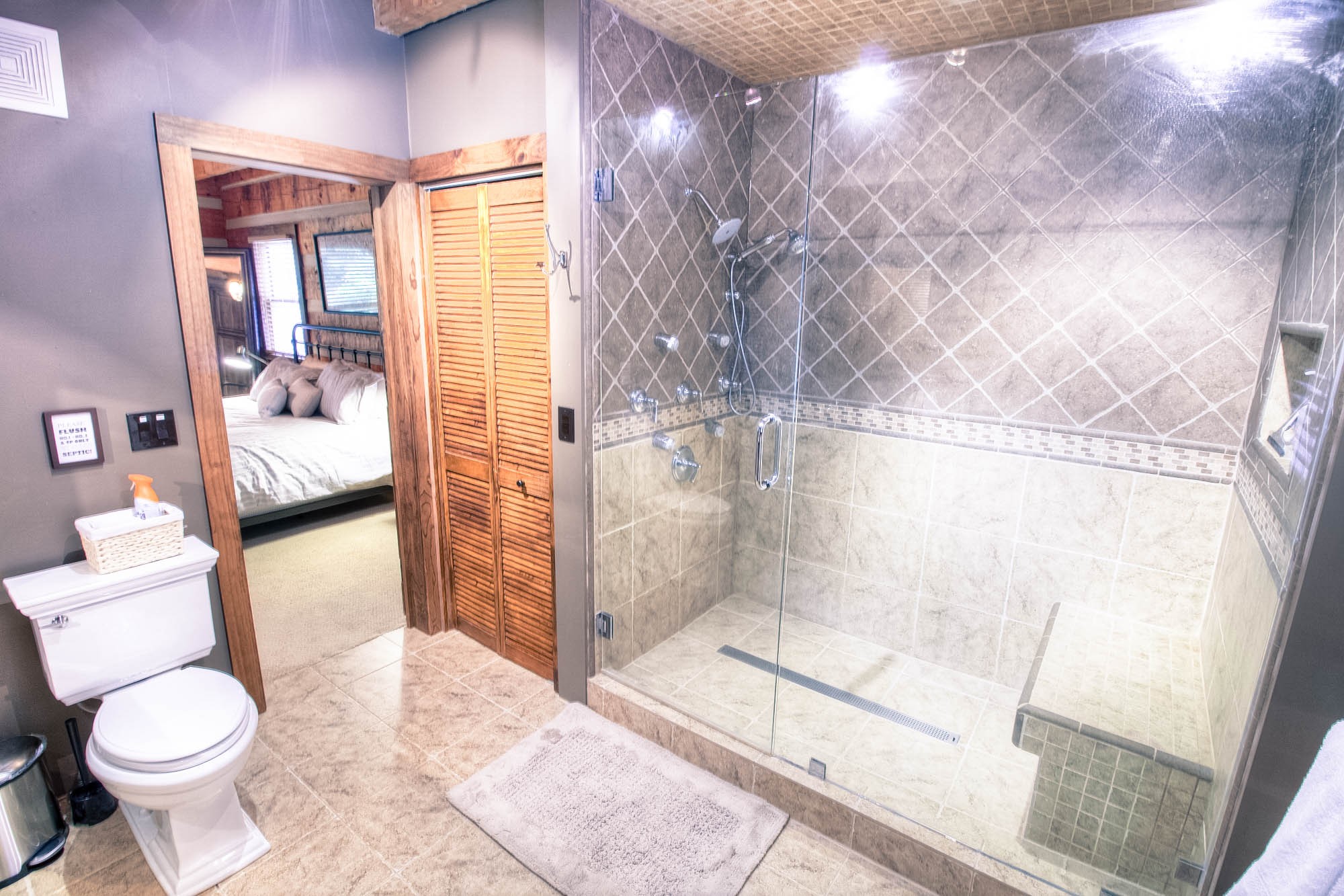 7394 Forest Glenn Road Fairview, TN 37062 - Photo 10 of 30 a bathroom with a toilet and a shower