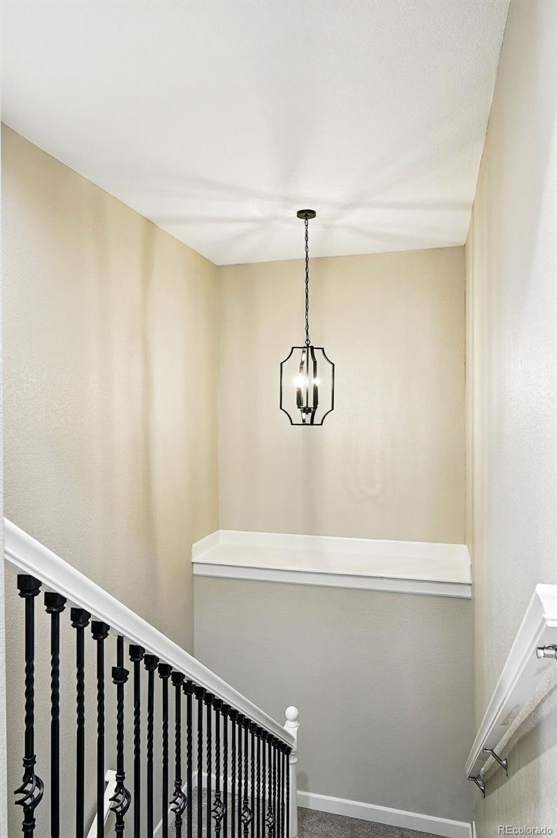 10320 West 35th Avenue Wheat Ridge, CO 80033 - Photo 28 of 46 a view of a hallway with a small space