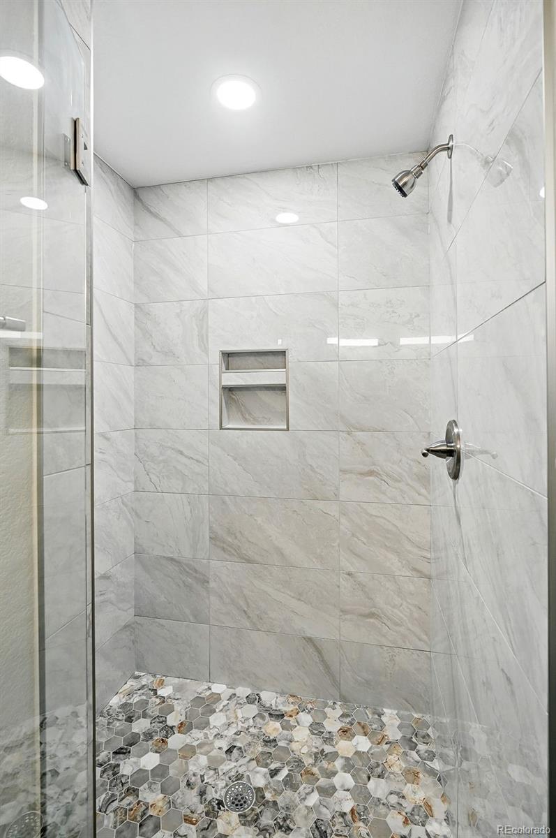 10320 West 35th Avenue Wheat Ridge, CO 80033 - Photo 35 of 46 a bathroom with a shower