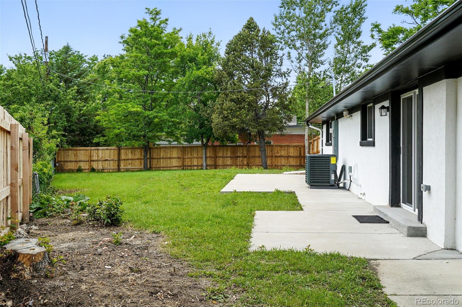 10320 West 35th Avenue Wheat Ridge, CO 80033 - Photo 37 of 46 a view of a backyard with a garden
