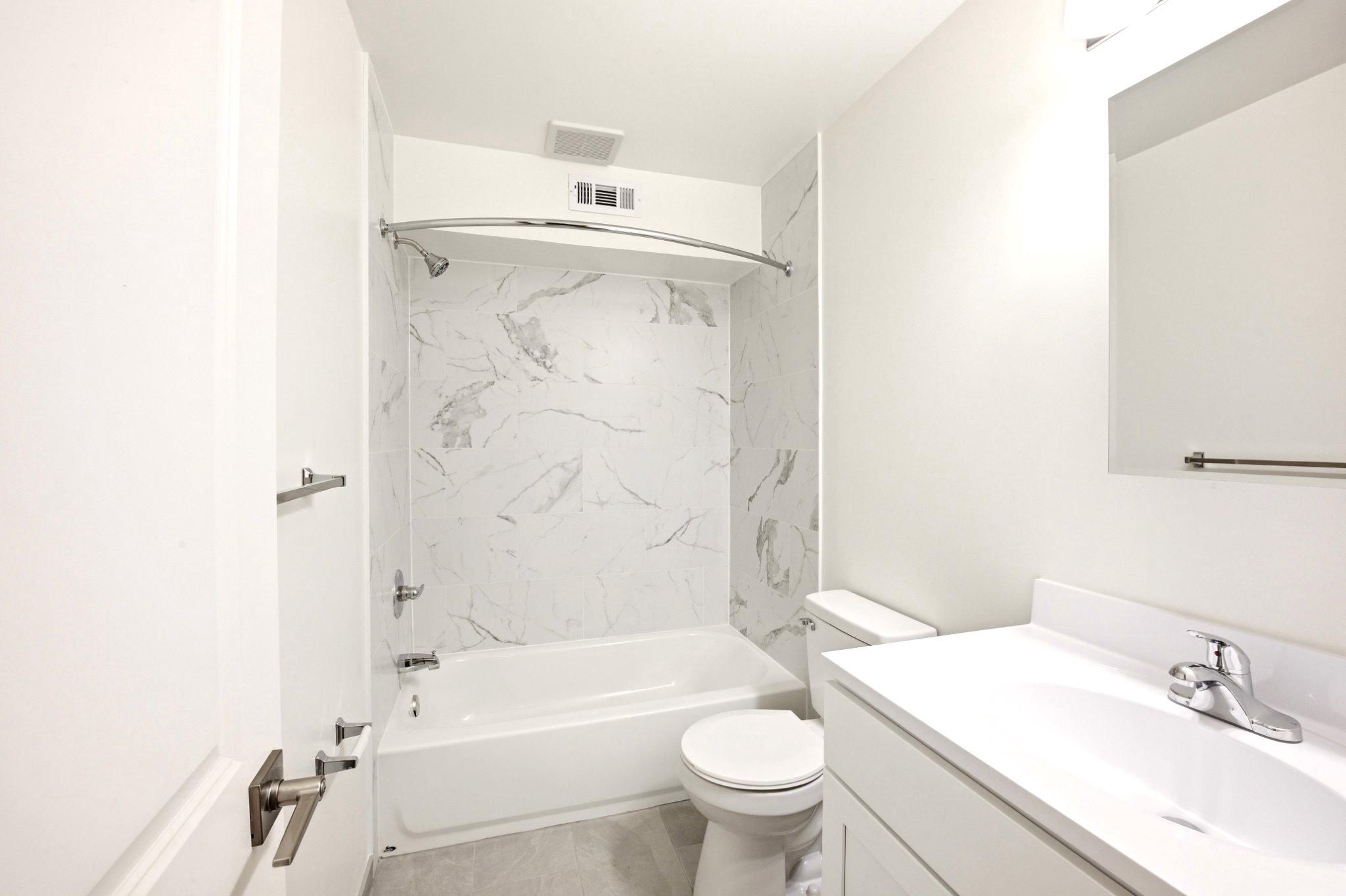 1207 Colony Court, Unit 122 Lebanon, PA 17042 - Photo 6 of 11 a bathroom with a sink toilet and shower