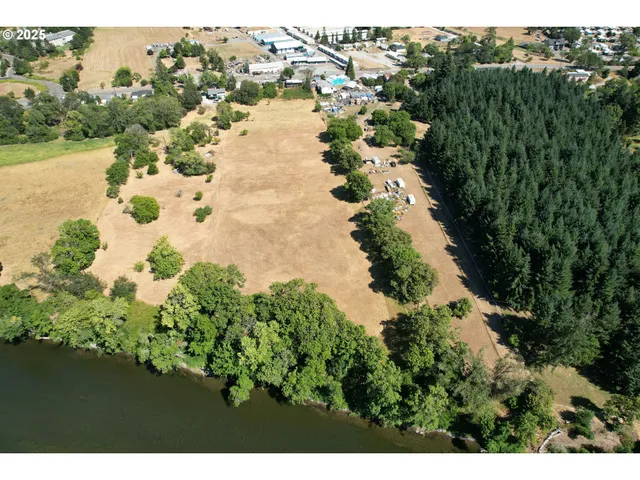 an aerial view of residential house with outdoor space