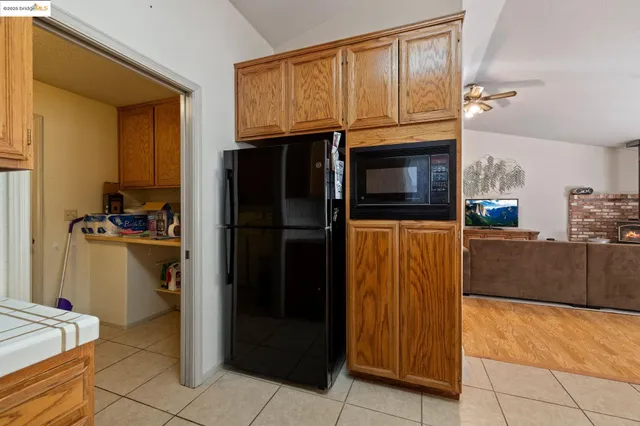 a view of storage and utility room with washer and dryer
