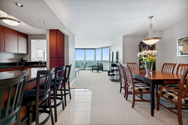 a view of a dining room with furniture