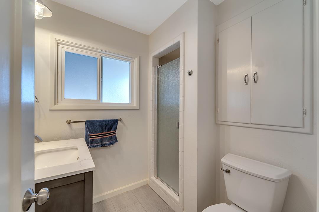 1197 Broadleaf Lane San Jose, CA 95128 - Photo 16 of 29 a bathroom with a toilet a sink and a shower