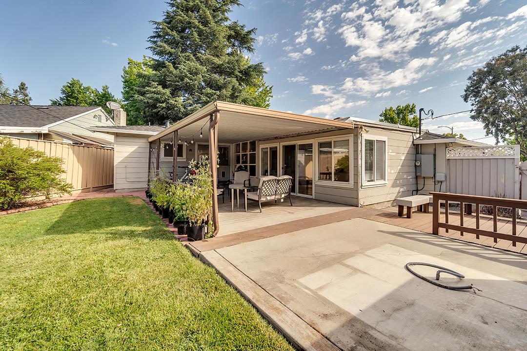 1197 Broadleaf Lane San Jose, CA 95128 - Photo 27 of 29 a view of a house with backyard and sitting area