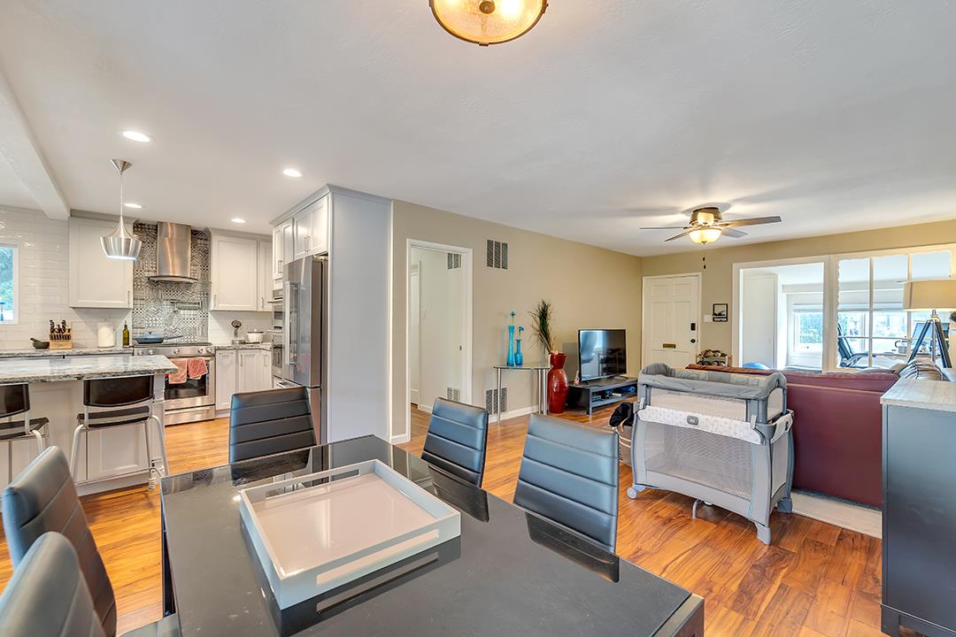 1197 Broadleaf Lane San Jose, CA 95128 - Photo 3 of 29 a living room with furniture kitchen and a dining table