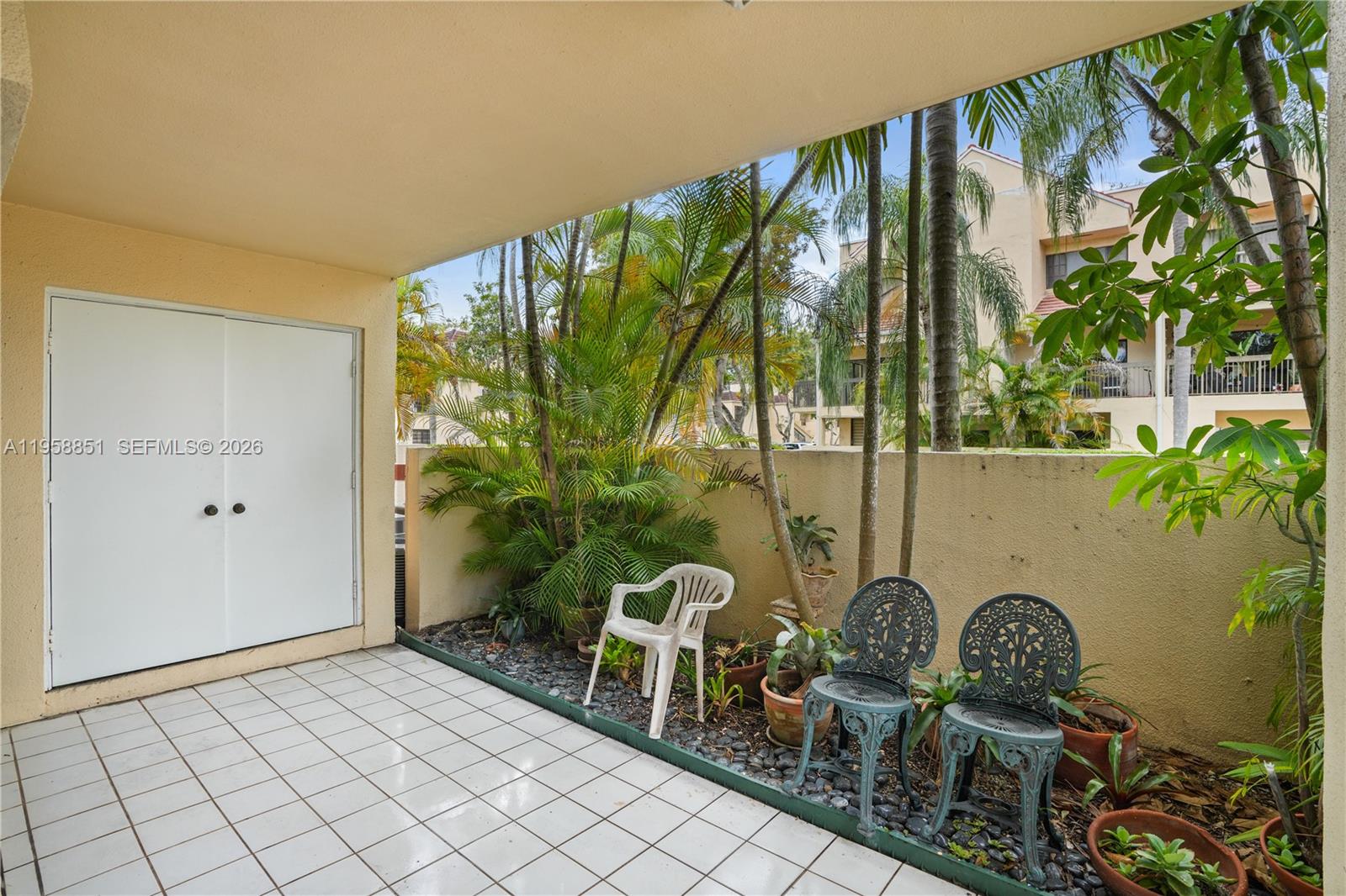 12930 Southwest 88th Terrace, Unit A104 Miami, FL 33186 - Photo 26 of 38 a balcony view with a outdoor space