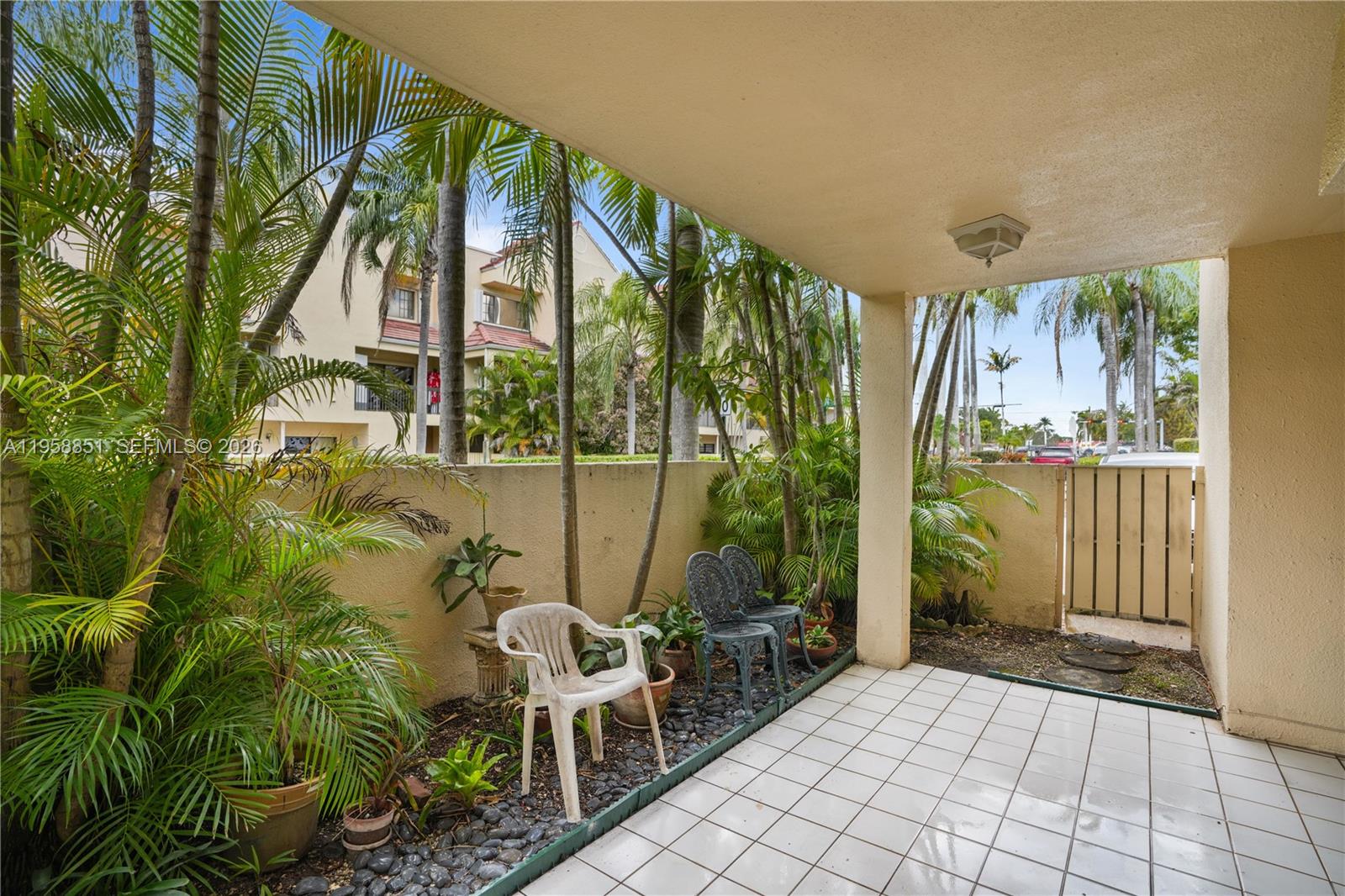 12930 Southwest 88th Terrace, Unit A104 Miami, FL 33186 - Photo 27 of 38 a view of balcony with furniture