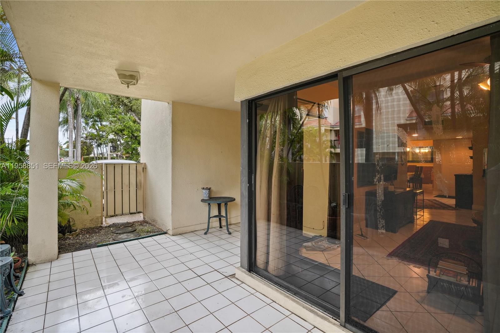 12930 Southwest 88th Terrace, Unit A104 Miami, FL 33186 - Photo 28 of 38 a bathroom with a glass door shower and a sink