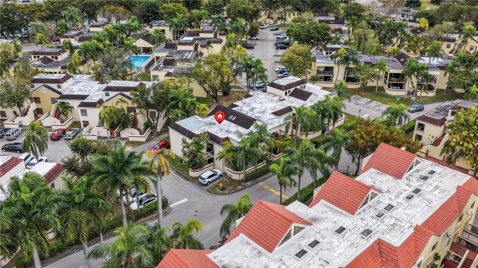 12930 Southwest 88th Terrace, Unit A104 Miami, FL 33186 - Photo 34 of 38 an aerial view of residential house with outdoor space and trees all around