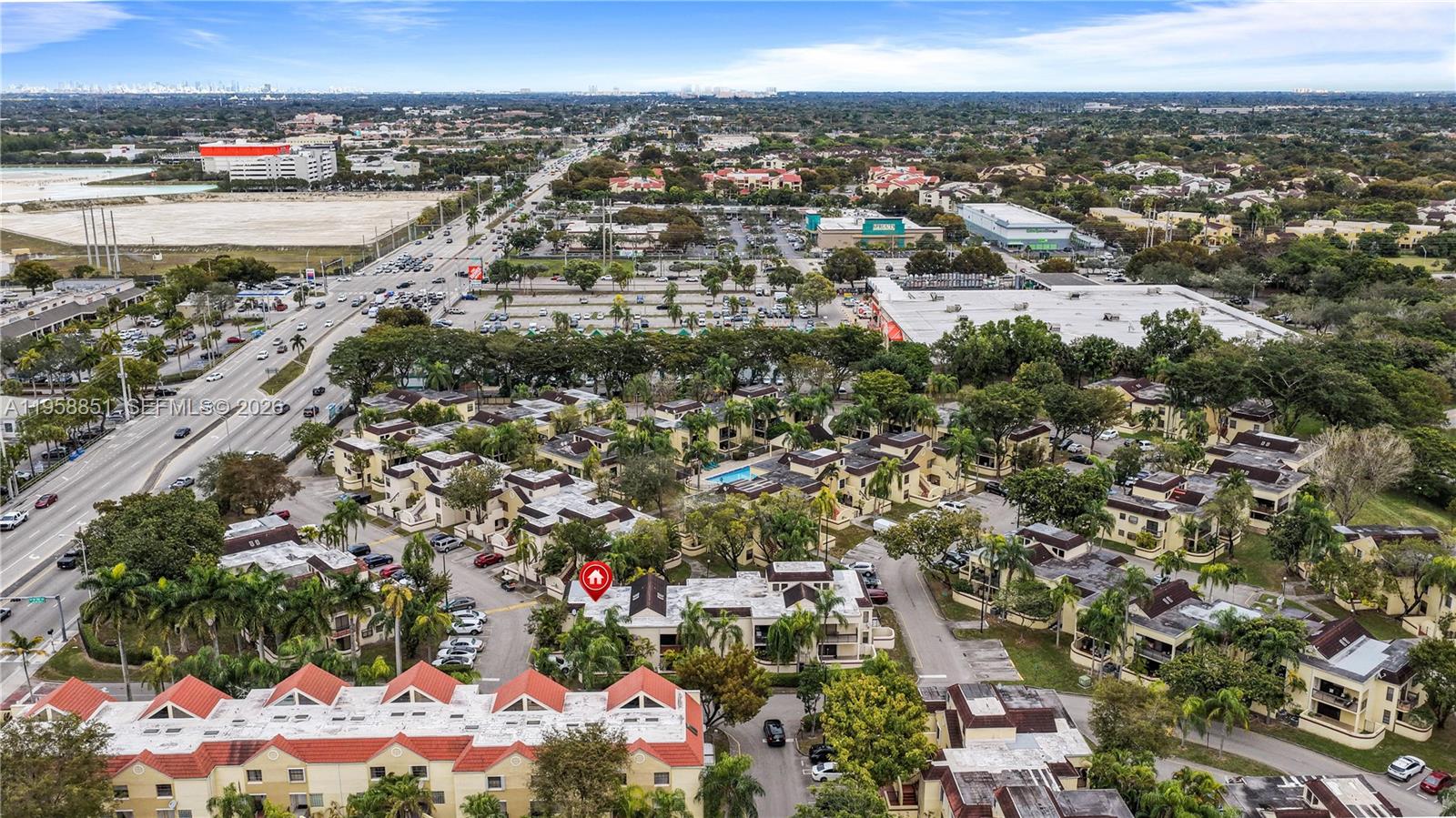 12930 Southwest 88th Terrace, Unit A104 Miami, FL 33186 - Photo 35 of 38 an aerial view of a city