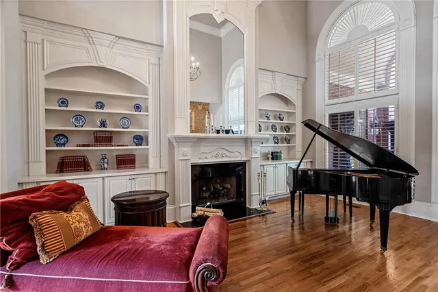 a bathroom with a large tub a sink a toilet a and a shower