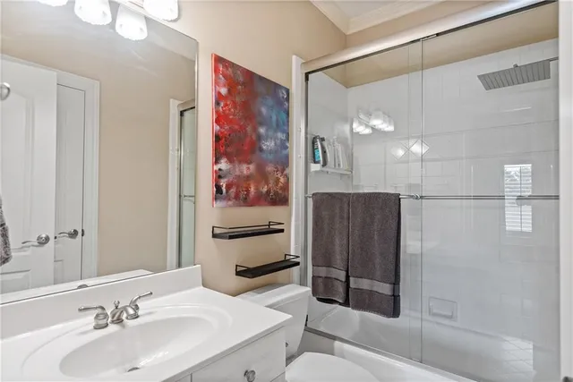 a room with furniture and pool table