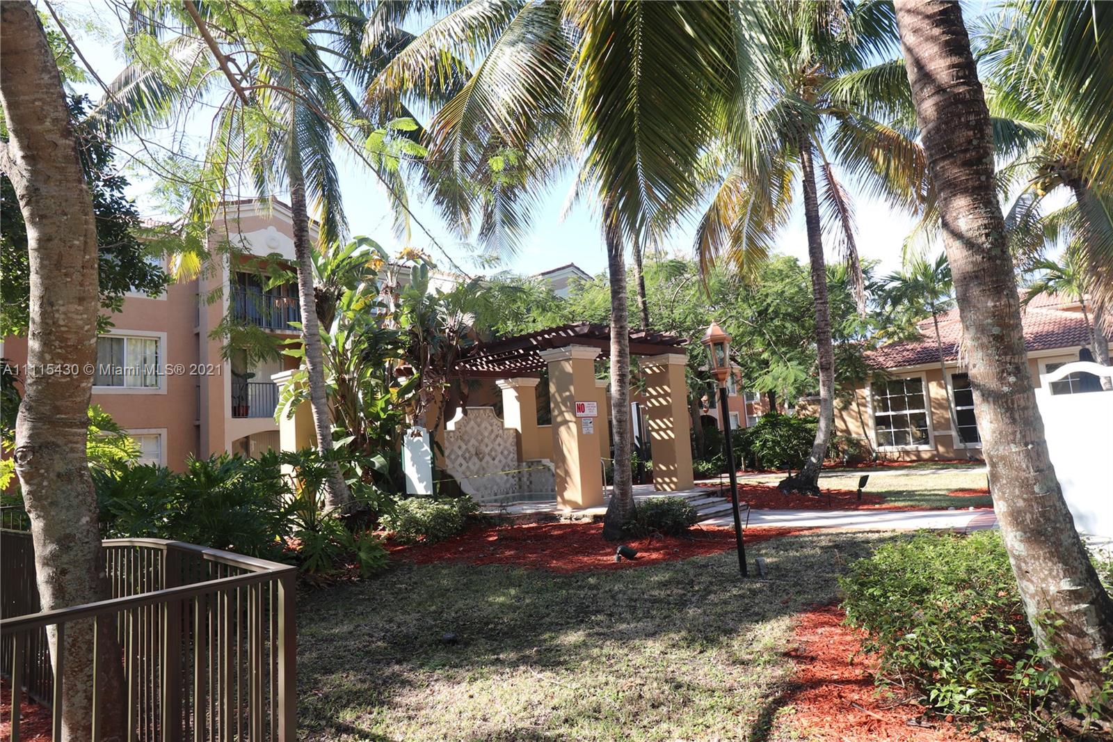 8020 North Nob Hill Road, Unit 208 Tamarac, FL 33321 - Photo 11 of 15 a view of a park with palm trees