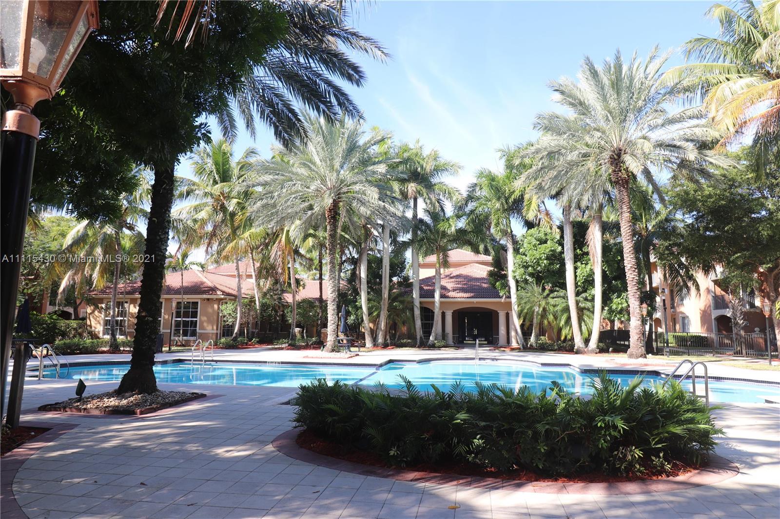 8020 North Nob Hill Road, Unit 208 Tamarac, FL 33321 - Photo 12 of 15 a view of a park with tree s