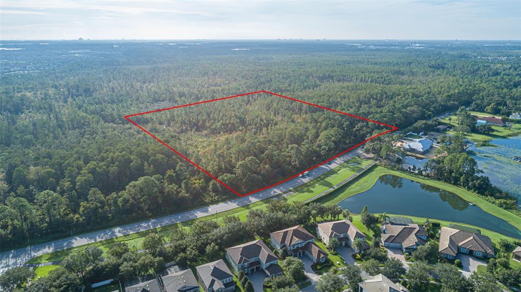 7545 Ficquette Road Windermere, FL 34786 - Photo 4 of 23 an aerial view of a house
