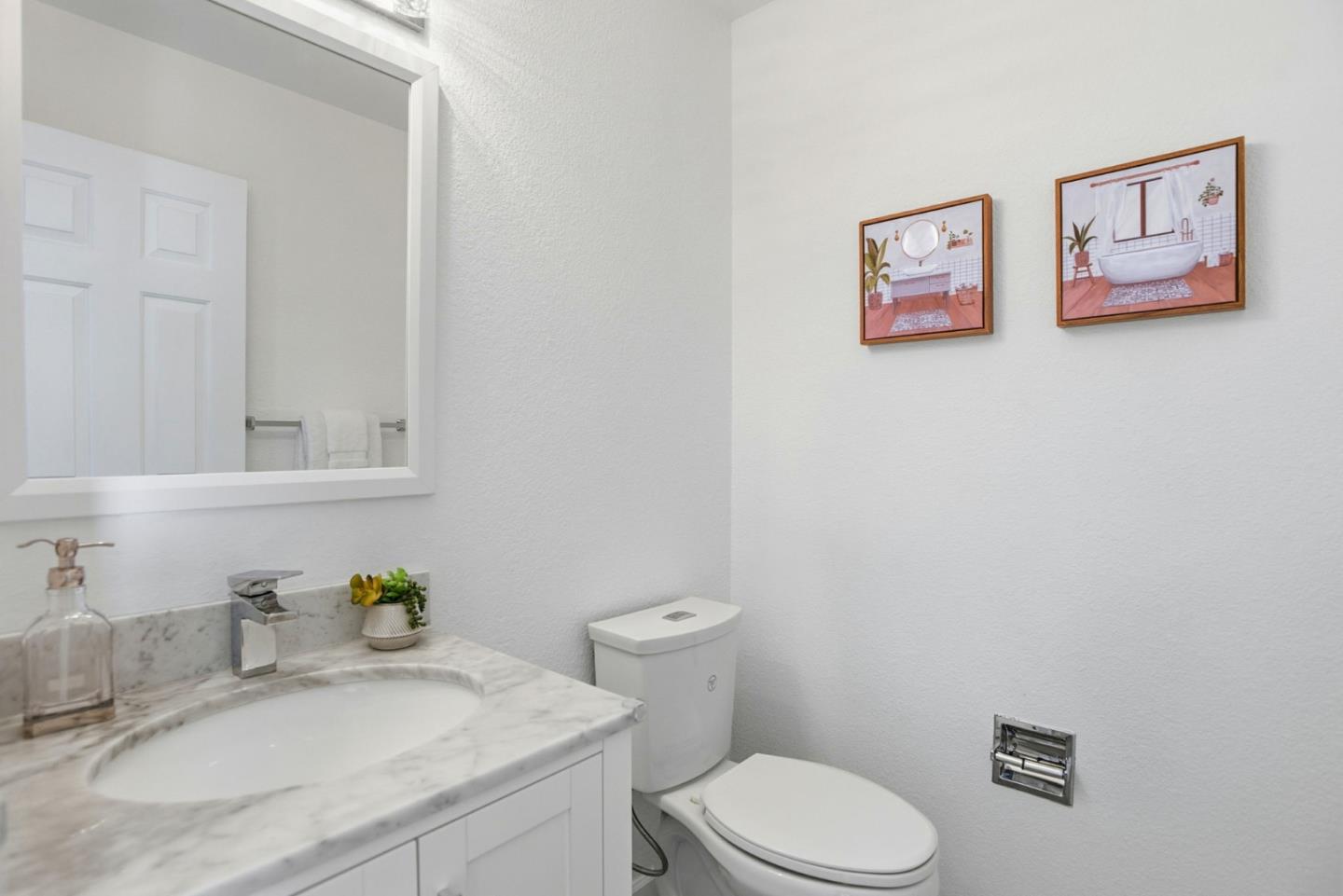 23 Dory Lane Foster City, CA 94404 - Photo 19 of 28 a bathroom with a granite countertop sink mirror and toilet
