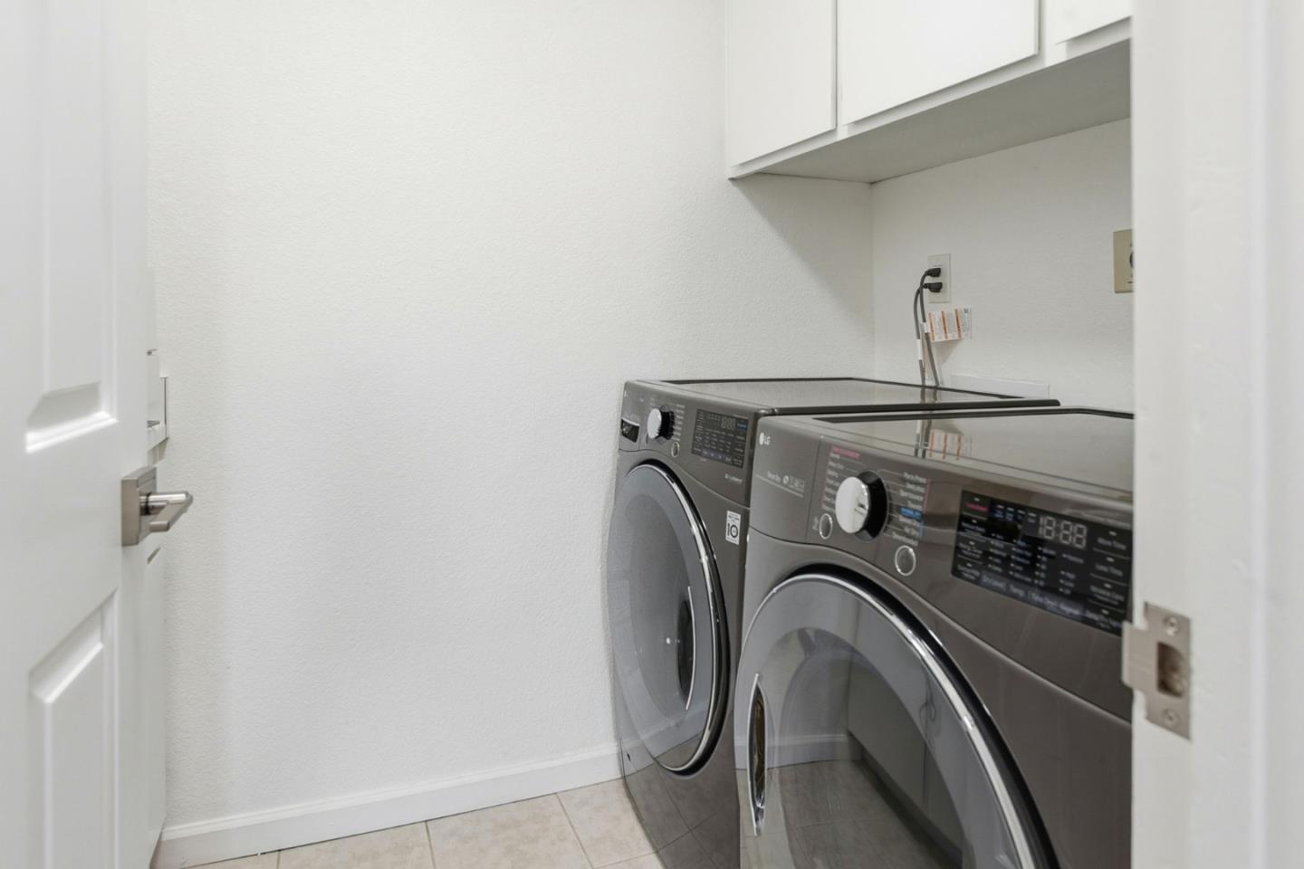 23 Dory Lane Foster City, CA 94404 - Photo 20 of 28 a utility room with dryer and washer
