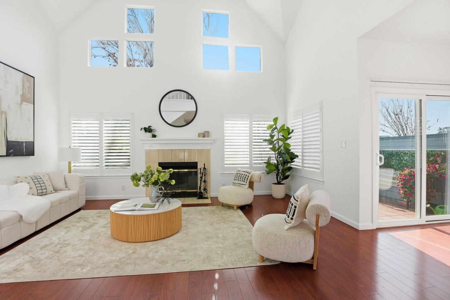 23 Dory Lane Foster City, CA 94404 - Photo 2 of 28 a living room with furniture potted plant and a fireplace
