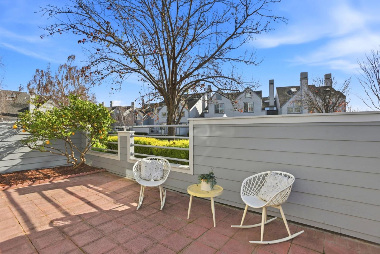 23 Dory Lane Foster City, CA 94404 - Photo 21 of 28 a view of a chairs and table in backyard