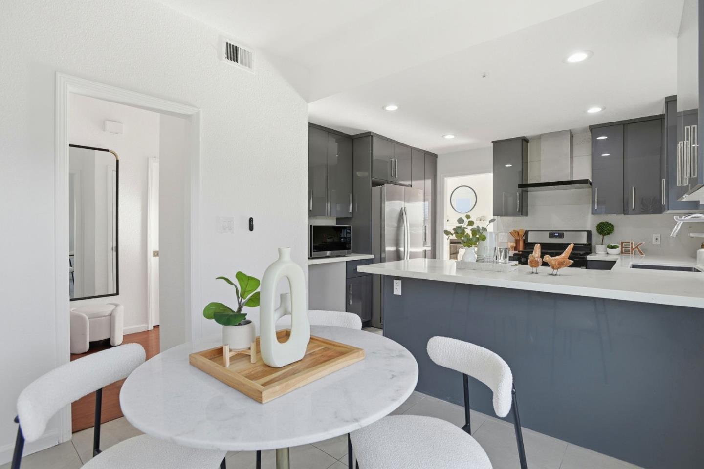 23 Dory Lane Foster City, CA 94404 - Photo 6 of 28 a view of kitchen with cabinets table and chairs