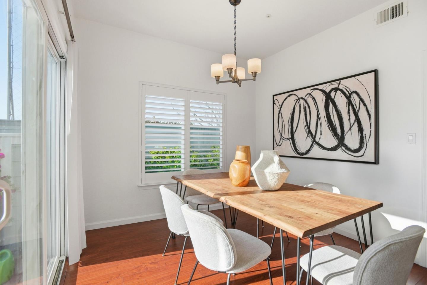 23 Dory Lane Foster City, CA 94404 - Photo 10 of 28 a view of a dining room with furniture window and wooden floor