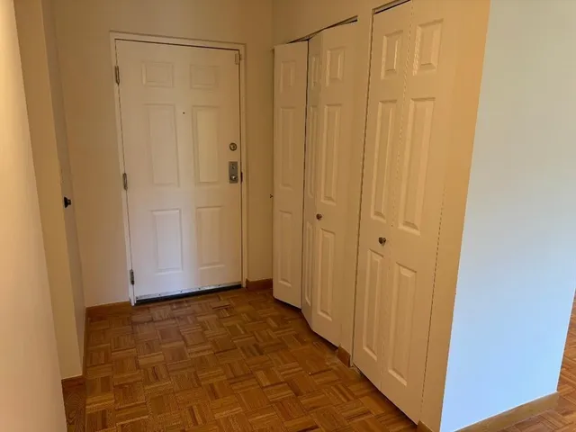 a view of a bathroom with wooden walls