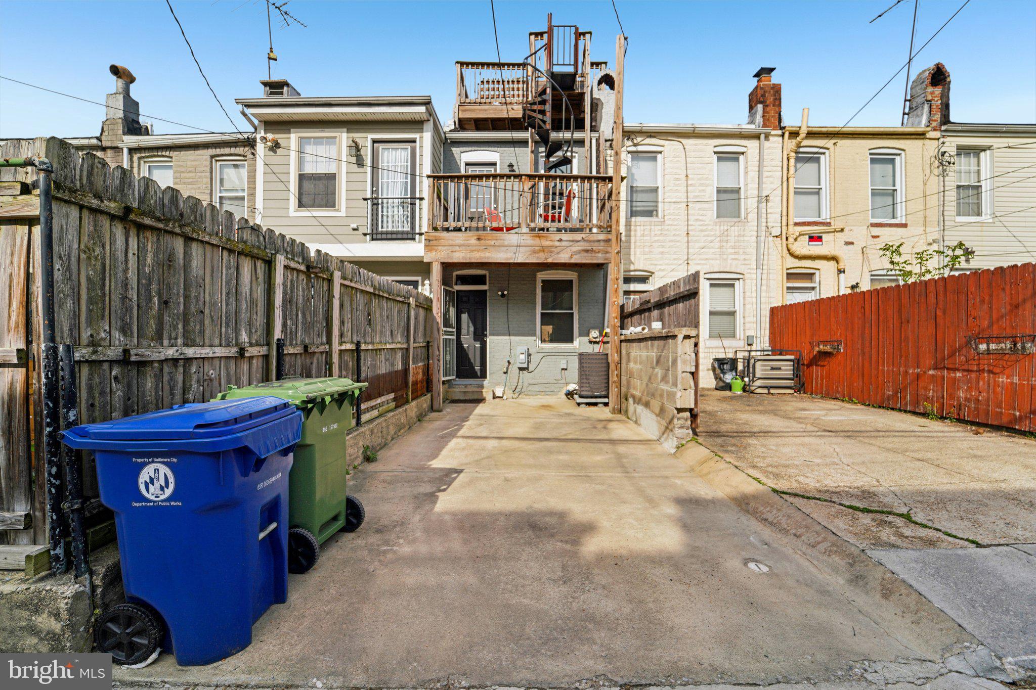 147 North Streeper Street Baltimore, MD 21224 - Photo 29 of 34 a view of a building with a porch
