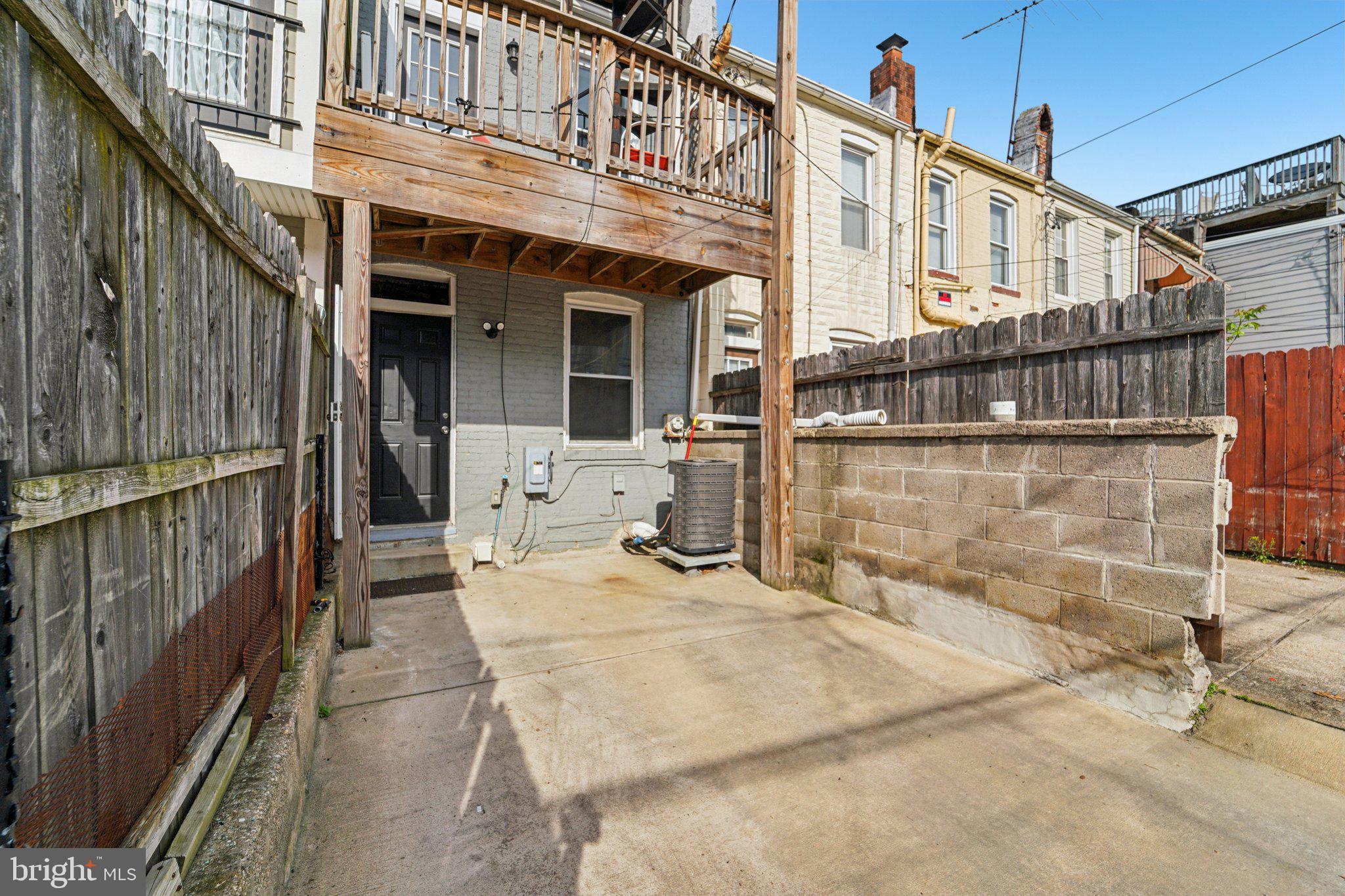 147 North Streeper Street Baltimore, MD 21224 - Photo 30 of 34 a view of a brick building with a outdoor space