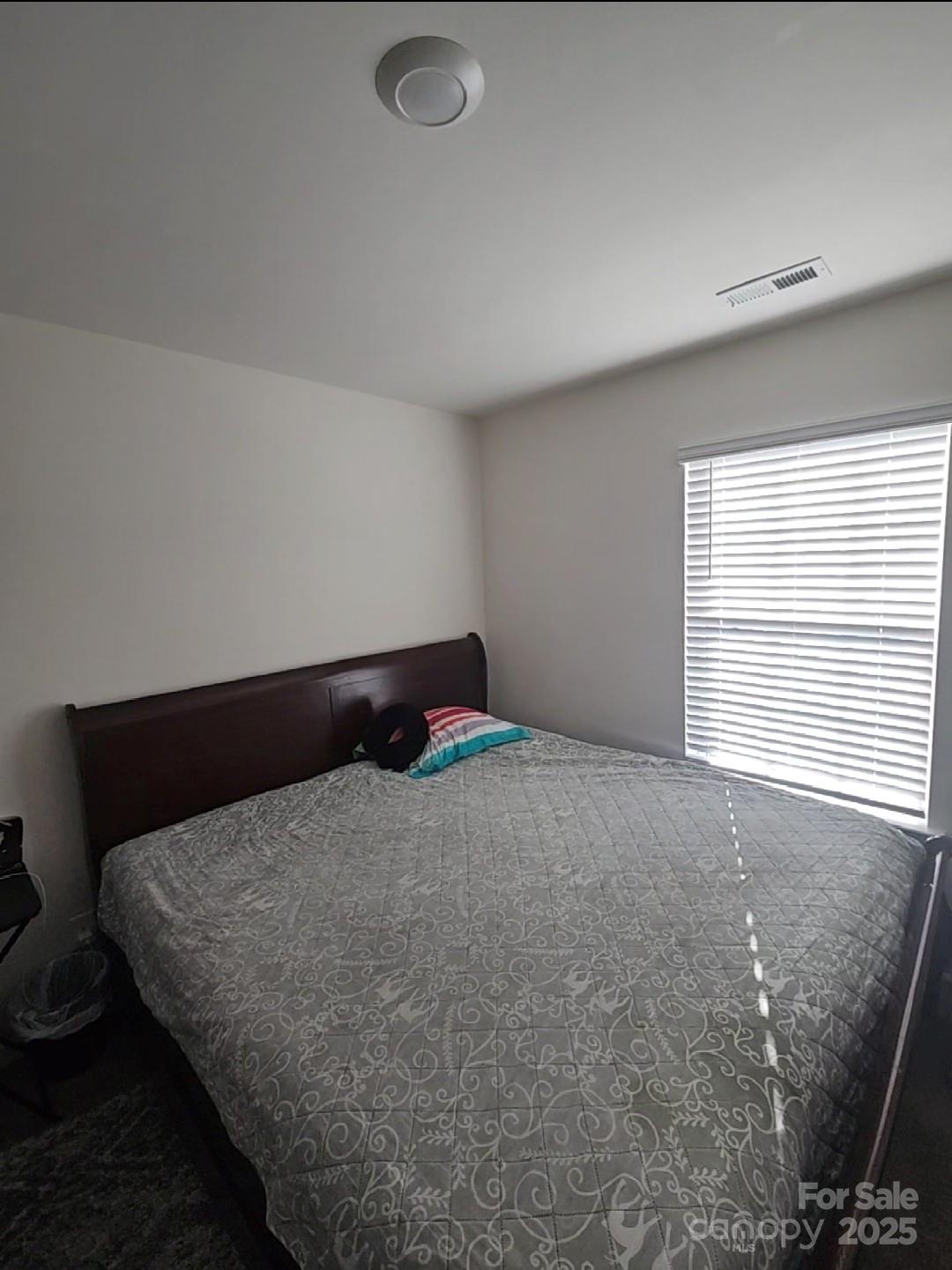 324 Gaines Road Clover, SC 29710 - Photo 6 of 11 a bed sitting in a room next to a window