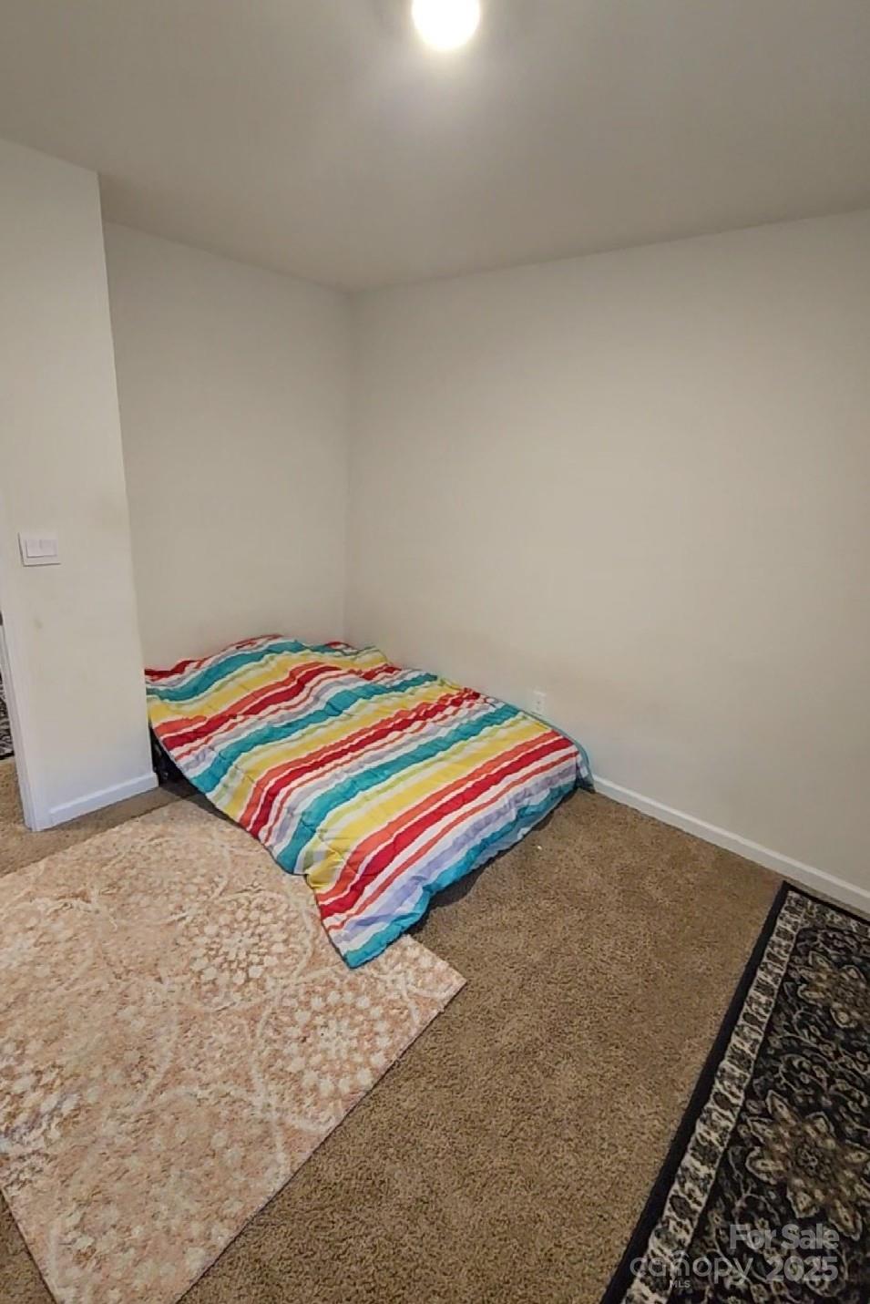 324 Gaines Road Clover, SC 29710 - Photo 8 of 11 a room with a bed and painted walls