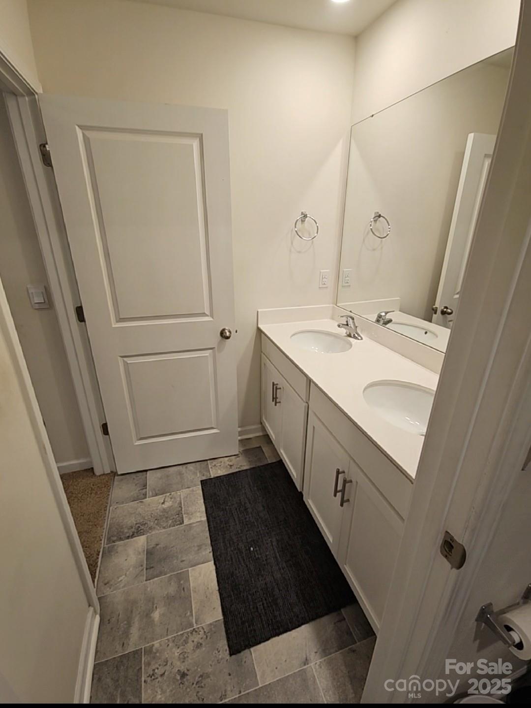 324 Gaines Road Clover, SC 29710 - Photo 9 of 11 a bathroom with a sink a toilet and a mirror