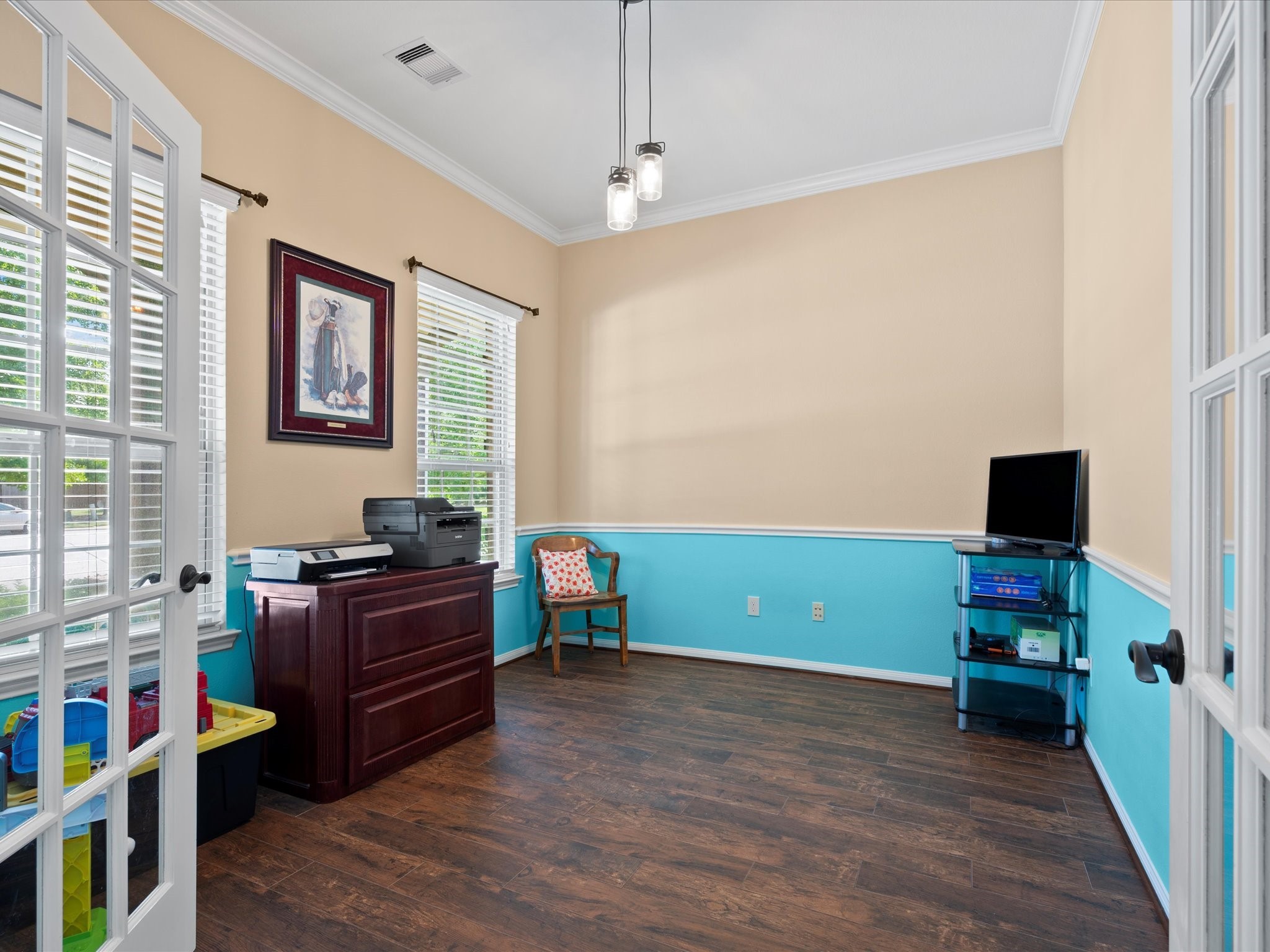 17254 Rookery Court Conroe, TX 77385 - Photo 14 of 36 a room with furniture and a flat screen tv