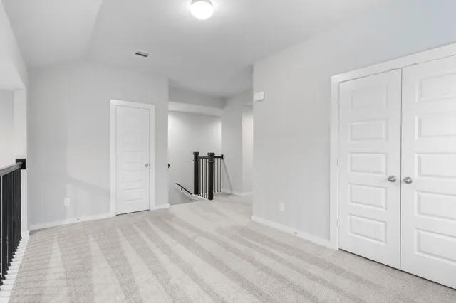 a view of a room with a bathroom